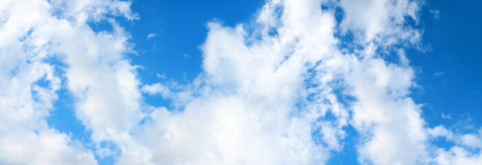 Obraz premium Blue sky with clouds. Sky background. Selective focus. Panorama