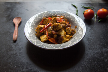 Close up of Kadai paneer, a popular north Indian semi dry dish made by cooking paneer or cottage cheese