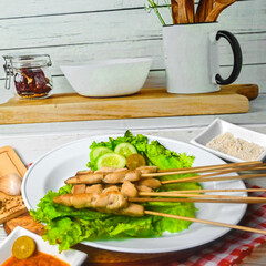 Taichan satay is a traditional food from Jakarta consisting of grilled chicken satay without soy sauce and peanut sauce