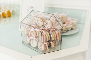 Delicious pink macaroons for guests. wedding ceremony