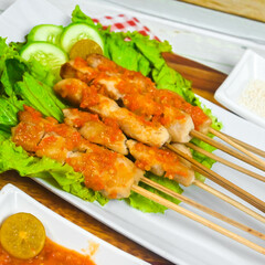 Taichan satay is a traditional food from Jakarta consisting of grilled chicken satay without soy sauce and peanut sauce