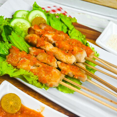Taichan satay is a traditional food from Jakarta consisting of grilled chicken satay without soy sauce and peanut sauce