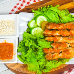 Taichan satay is a traditional food from Jakarta consisting of grilled chicken satay without soy sauce and peanut sauce