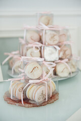 Delicious pink macaroons for guests. wedding ceremony