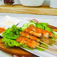 Taichan satay is a traditional food from Jakarta consisting of grilled chicken satay without soy sauce and peanut sauce