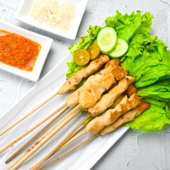 Taichan satay is a traditional food from Jakarta consisting of grilled chicken satay without soy sauce and peanut sauce