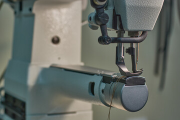 Sewing machine for watering heavy materials