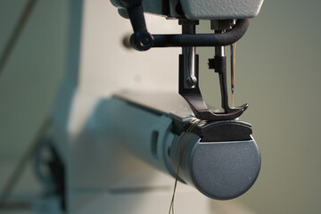 Sewing machine for watering heavy materials