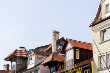 Houses and streets with historic residential facades in the Bavarian port city of Lindau on Lake Constance