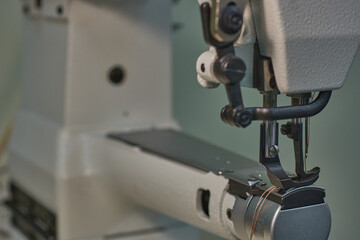 Sewing machine for watering heavy materials