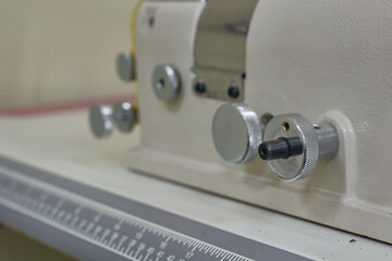 Sewing machine for watering heavy materials
