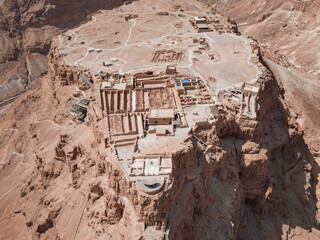 Aerial view of ruins of fortress Masada National Park, Southern District of Israel. Ancient...