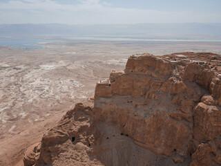 Aerial view of ruins of fortress Masada National Park, Southern District of Israel. Ancient fortification built by Herod the Great on a cliff-top off the Dead Sea coast. In UNESCO World Heritage List