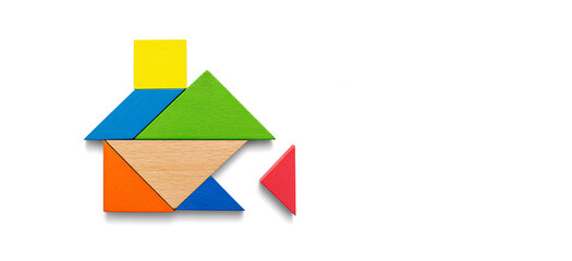 Wooden tangram puzzle wait to fulfill home shape for build dream home, happy life, house or mortgage investment concept