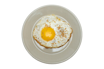 Half-boiled fried egg in a bowl