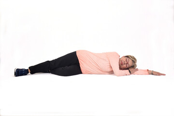 front view of a woman lying on the floor asleep white background