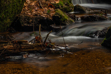 Cerveny creek with Cerveny waterfall in Jizerske mountains in spring morning