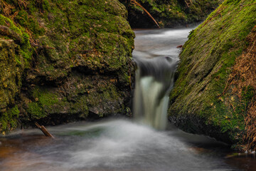 Cerveny creek with Cerveny waterfall in Jizerske mountains in spring morning