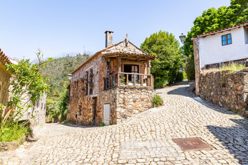 a cobbled street with traditional houses at Casal de São Simão Schist village (Aguda), Figueiró dos Vinhos, district of Leiria, Beira Litoral, Portugal