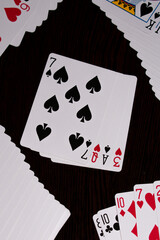 playing cards on black background
word love written with cards