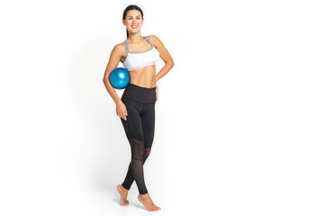 Fototapeta na wymiar Muscular woman doing core exercises with a medecine ball