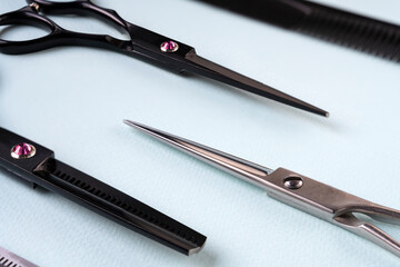 Background for the hairdresser. Hairdressing set. Hairdressing scissors. hairdressing tools. A haircut