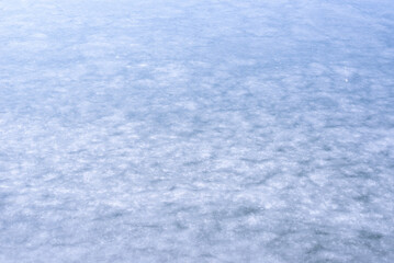Natural texture of ice, frozen lake  as  background.