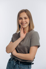 portrait of a young beautiful girl with braces, on a white background