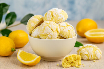 Lemon cookies  with cracks in a bowl. Delicious healthy citrus dessert. selective focus