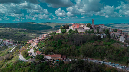 Aerial drone view of magnificent village of Motovun in Croatian Istria on a sunny day with cute fluffy clouds. Idyllic view of picturesque istrian village.ž