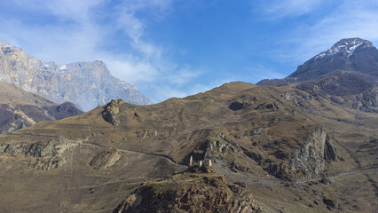 View of the ruined castle in the mountains of the Caucasus