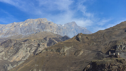 View of the ruined castle in the mountains of the Caucasus