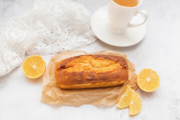 Lemon bread, cake with citrus,  whole loaf.  White background,  copy space.