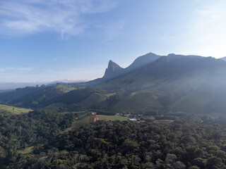 Beautiful country town with beautiful mountain on the horizon and green fields in nature - Pedra Azul, Espirito Santo, Brazil
