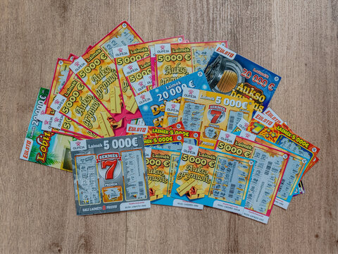 04 18 2022 - Kaunas, Lithuania: Many different scrapped instant scratch lottery tickets 