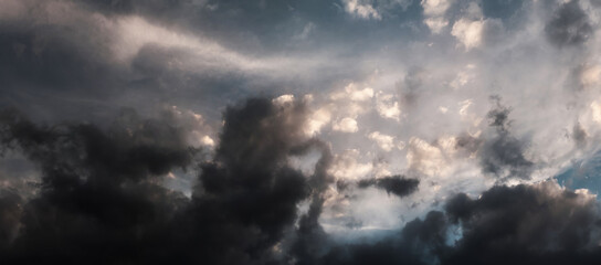 Fototapeta na wymiar Panorama of dramatic cloudy overcast sky