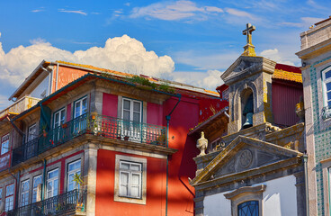 Porto, Portugal. Traditional houses with walls, covered with decorative portuguese tiles azulejo.