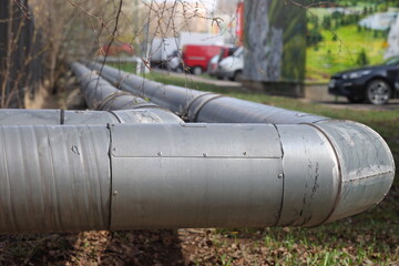 Overground heat pipes. Pipeline above the earth conducting heat for heating city.