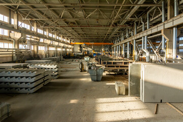 Concrete production factory with reinforced concrete elements and raw materials