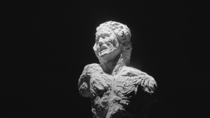 A white statue of a man. A close-up shot on a black background.