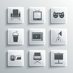 Set Director movie chair, Projection screen, Movie spotlight, Online play video, Cinema camera, Paper glass with straw, and Comedy and tragedy masks icon. Vector