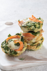 Egg muffins with salmon, spinach and cheese