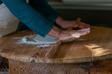 A woman making pancakes in Antalya, Turkey. SELECTİVE FOCUS