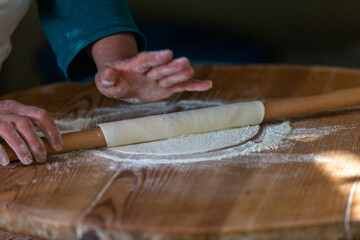 A woman making pancakes in Antalya, Turkey. SELECTİVE FOCUS
