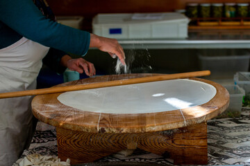 Fototapeta na wymiar A woman making pancakes in Antalya, Turkey. SELECTİVE FOCUS
