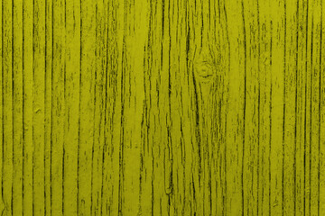 Fototapeta na wymiar Texture of old painted wooden surface with yellow paint. Bright wooden table. Copy Space.