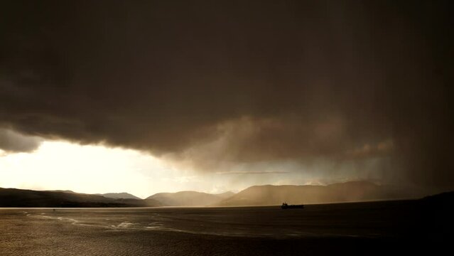 A Raincloud Passes Down River And Drops It's Payload.