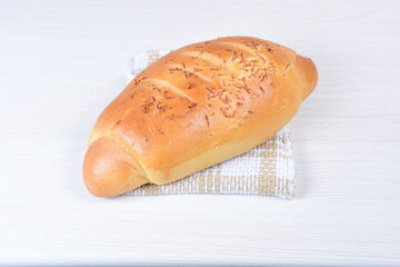 Cornbread with cheese on wooden background