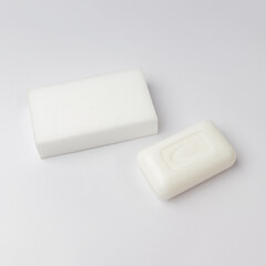 top view of soap and melamine cleaning sponge on white background, mockup