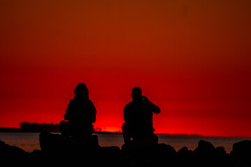 Fototapeta na wymiar Couple looking at the sunset, Córdoba, Argentina